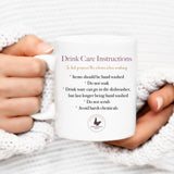 Mug care instructions label showing drinkware guidance for safe washing and handling of printed ceramic mugs.