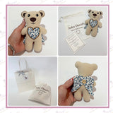 Two personalised Always With You memorial bears with optional angel wings, personalised gift pouches and keepsake poem cards displayed together.