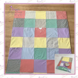 Handmade patchwork memory blanket created from a loved one's treasured clothing, preserving special fabrics and colours in a personalised keepsake blanket with soft anti-pill fleece backing.