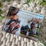 Angled view of a personalised landscape crystal photo block featuring an engagement collage.