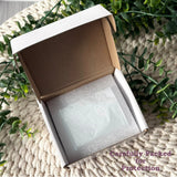 Open presentation box with protective padding for safely packing the crystal photo block