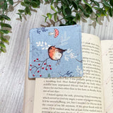 Close-up of the back robin fabric design on handmade corner bookmark, 8cm x 8cm in size.