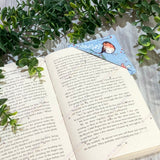 Bookmark angled to show stitching detail and fabric quality.