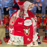 Handmade keepsake Christmas sack made from baby's First Christmas clothes with personalised name
