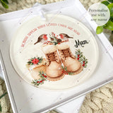 Acrylic robin memorial bauble hanging on a white ribbon – features robins and boots illustration with “Robins appear when loved ones are near” quote, personalised with any name.