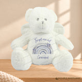 Design mockup of a white angel bear with a personalised Forget-me-not rainbow and Grandad wording on its tummy