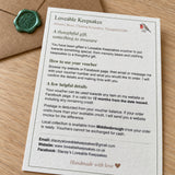 Information card: “Gift voucher information card explaining redemption, validity and contact details, beside a sealed kraft envelope.