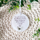 Close-up of personalised acrylic remembrance bauble with green butterfly and white flowers, featuring heartfelt quote about loved ones who have passed – personalised memorial decoration.