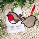 Front and back view of a handmade felt robin Christmas decoration on a remembrance card with red hanging ribbon.