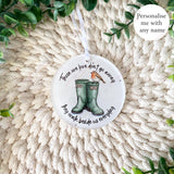 Robin boots remembrance bauble with Mum and Dad shown from a distance on display