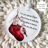 Close-up of robin remembrance stocking bauble with personalised name tag reading Mum