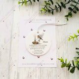 Robin and candle remembrance bauble for Mum, displayed on a printed presentation backing card.