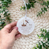 Personalised robin remembrance bauble with 'Mam' design and candle illustration