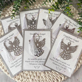 Multiple guardian angel bookmarks displayed together on backing cards, suitable as sympathy keepsakes or funeral favours.