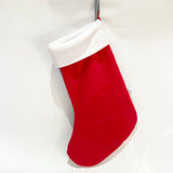 Back view of handmade memory patchwork Christmas stocking in red and white fleece, fully lined and crafted to high quality.