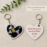 Front and reverse of a handmade memory heart keyring, showing loved one’s clothing and a personalised printed message.