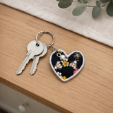 Handmade fabric memory heart keyring attached to a set of everyday keys