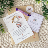 Handmade robin memorial card and keyring displayed in packaging, ready to send