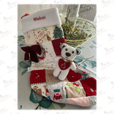 Personalized Christmas stocking with teddy bear and festive design on a white background